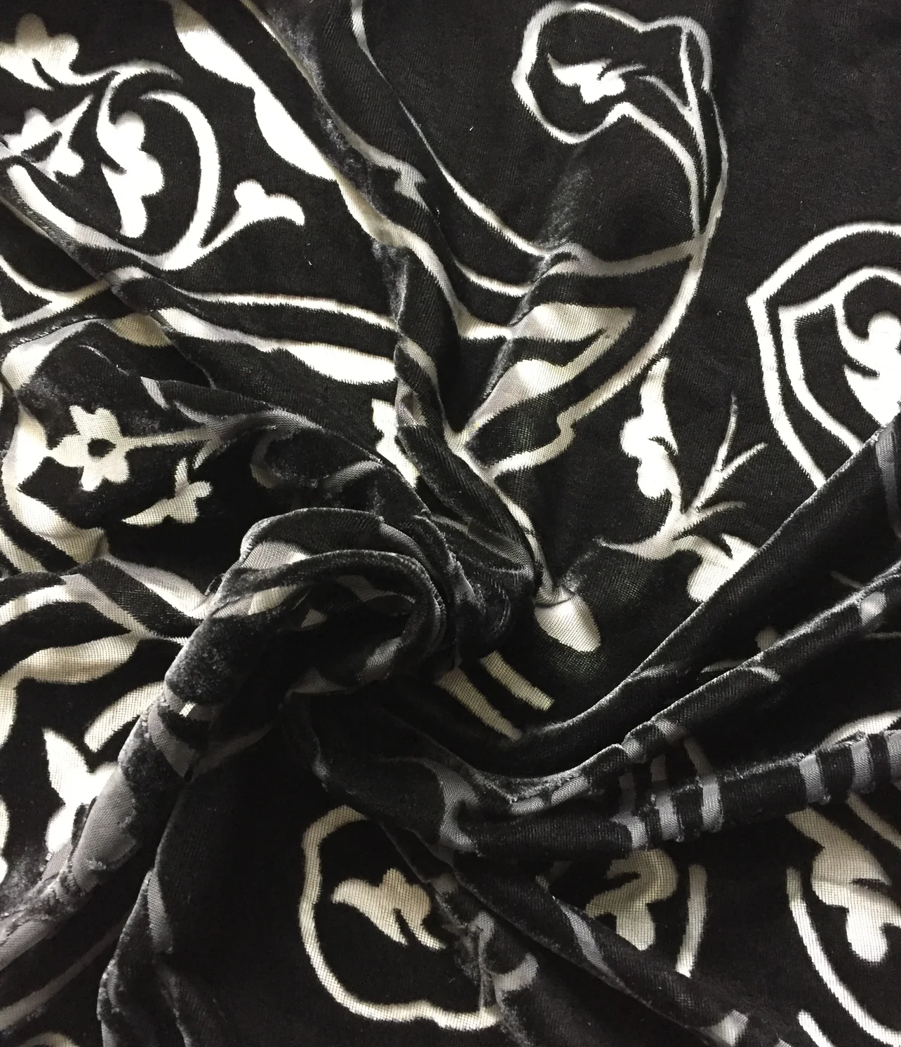 burnout velvet black scroll flourish on white