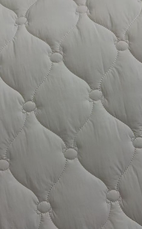 Q-02 light grey teardrop quilted fabric
